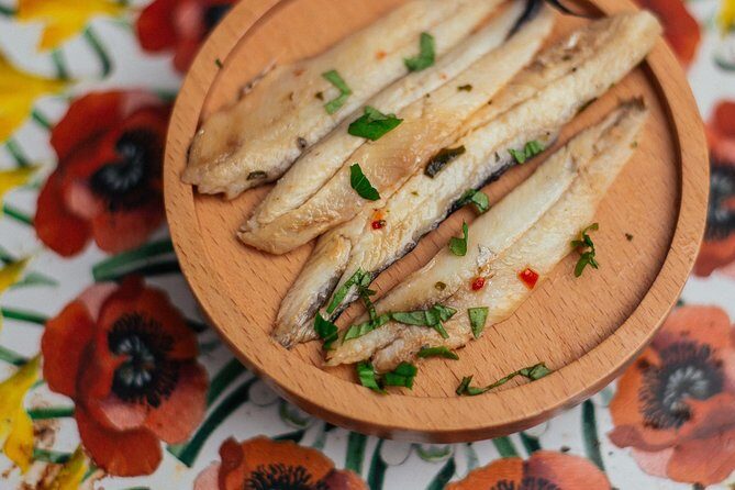 The 10 Tastings of Valencia With Locals: Private Food Walking Tour - Stop 2: La Lonja de la Seda and Valencia classics you can taste