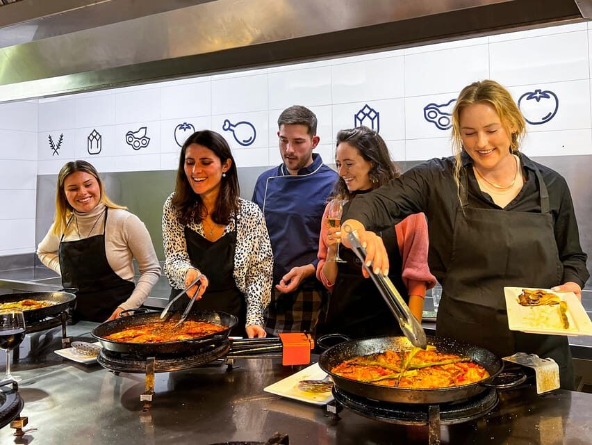 Valencia: Paella Cooking Class with Central Market Tour - The kitchen portion: your station, the chef’s pacing, and real cooking time
